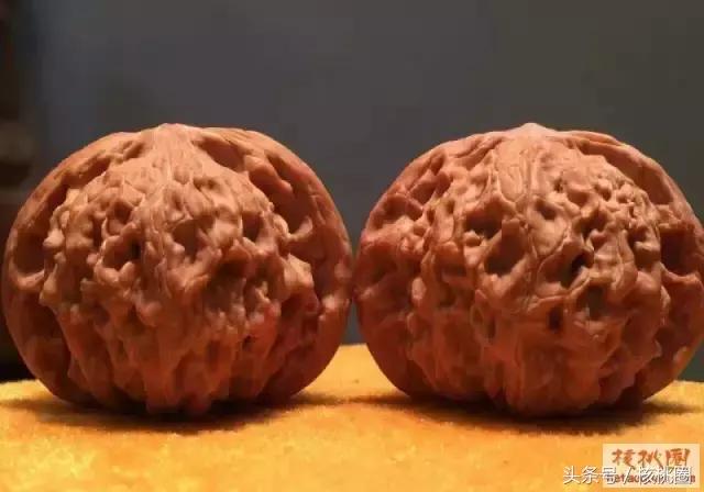 圆润的磨盘狮子头,文玩核桃磨盘狮子头有什么特征