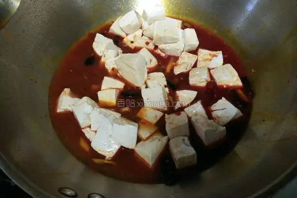 豆腐的这种做法太下饭了，咬一口会爆汁，孩子把盘子都舔干净