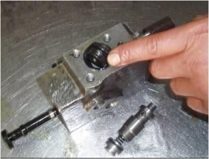 拖拉机液压分配器下降太快怎么调,拖拉机内置提升器分配器维修