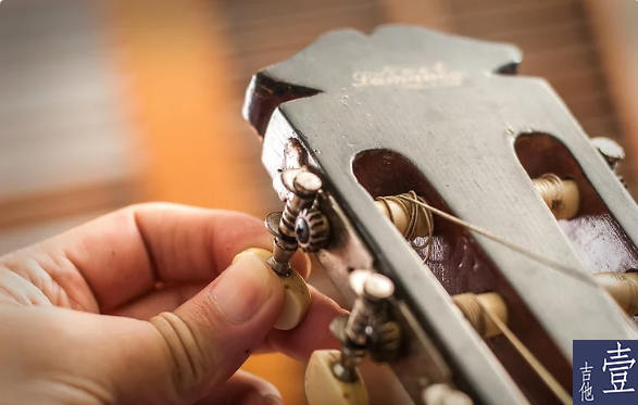 北航吉他,如何换吉他新弦