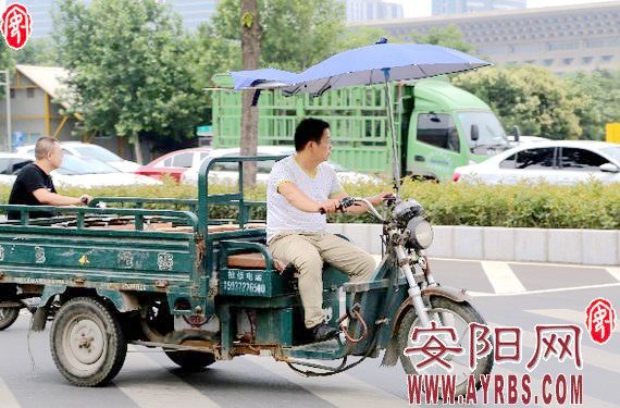 电动车打伞,电动车合法挡雨