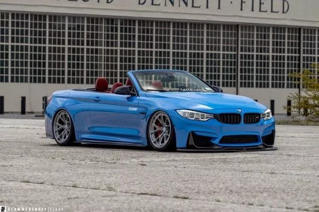 改装的宝马m4直接趴在地上了,普通的宝马m4可以开敞篷