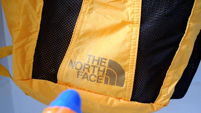 轻便大容量防水背包,northface帆布双肩背包