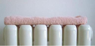 如何防止暖气片熏黑墙面,暖气片把白墙都烤黑了有什么办法