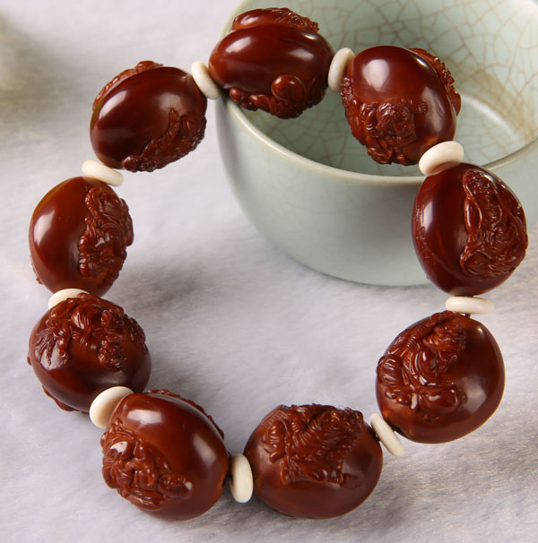 百匠诀核雕使用方法,橄榄核雕的盘玩方法