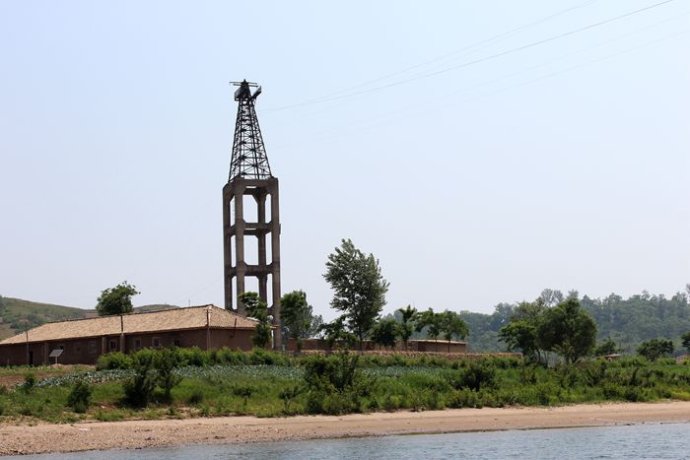 中朝边境美丽的风景,中朝边境桃花盛开的地方