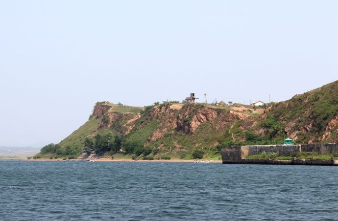 中朝边境美丽的风景,中朝边境桃花盛开的地方