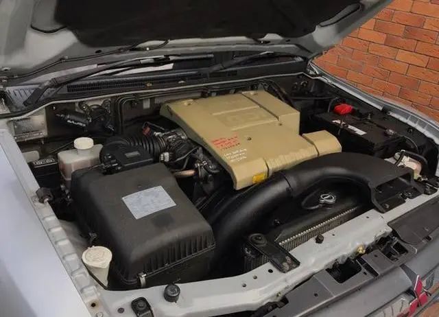 三菱山猫帕杰罗evo,三菱帕杰罗v87和evo发动机一样吗