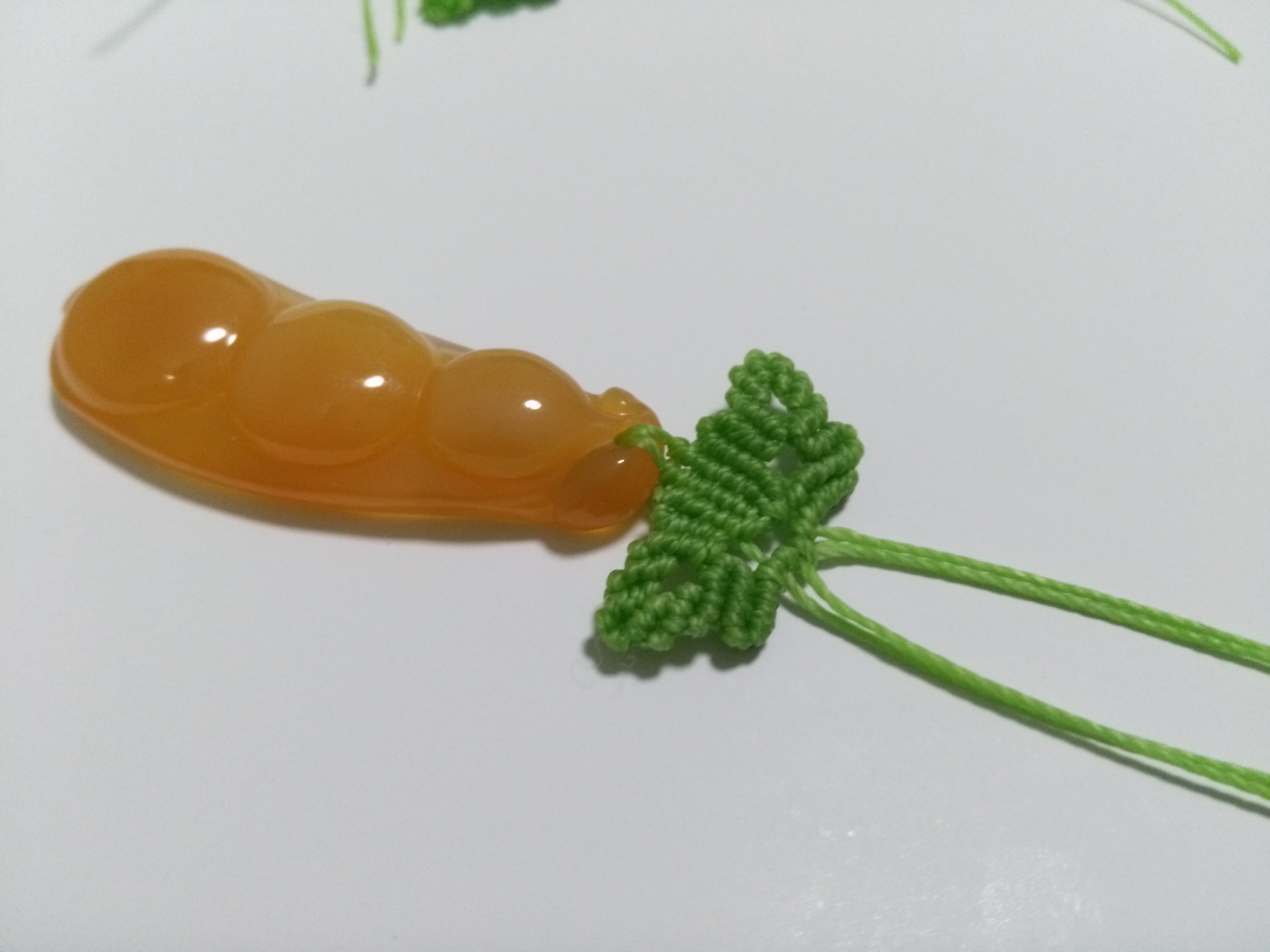 玛瑙豆子编手机吊坠法教程,玉豌豆吊坠怎么编绳