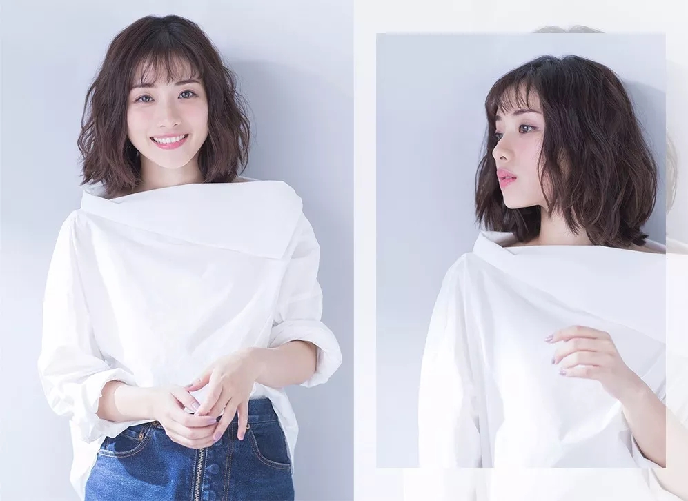 肩位很卷的发型,齐肩往下一点的发型