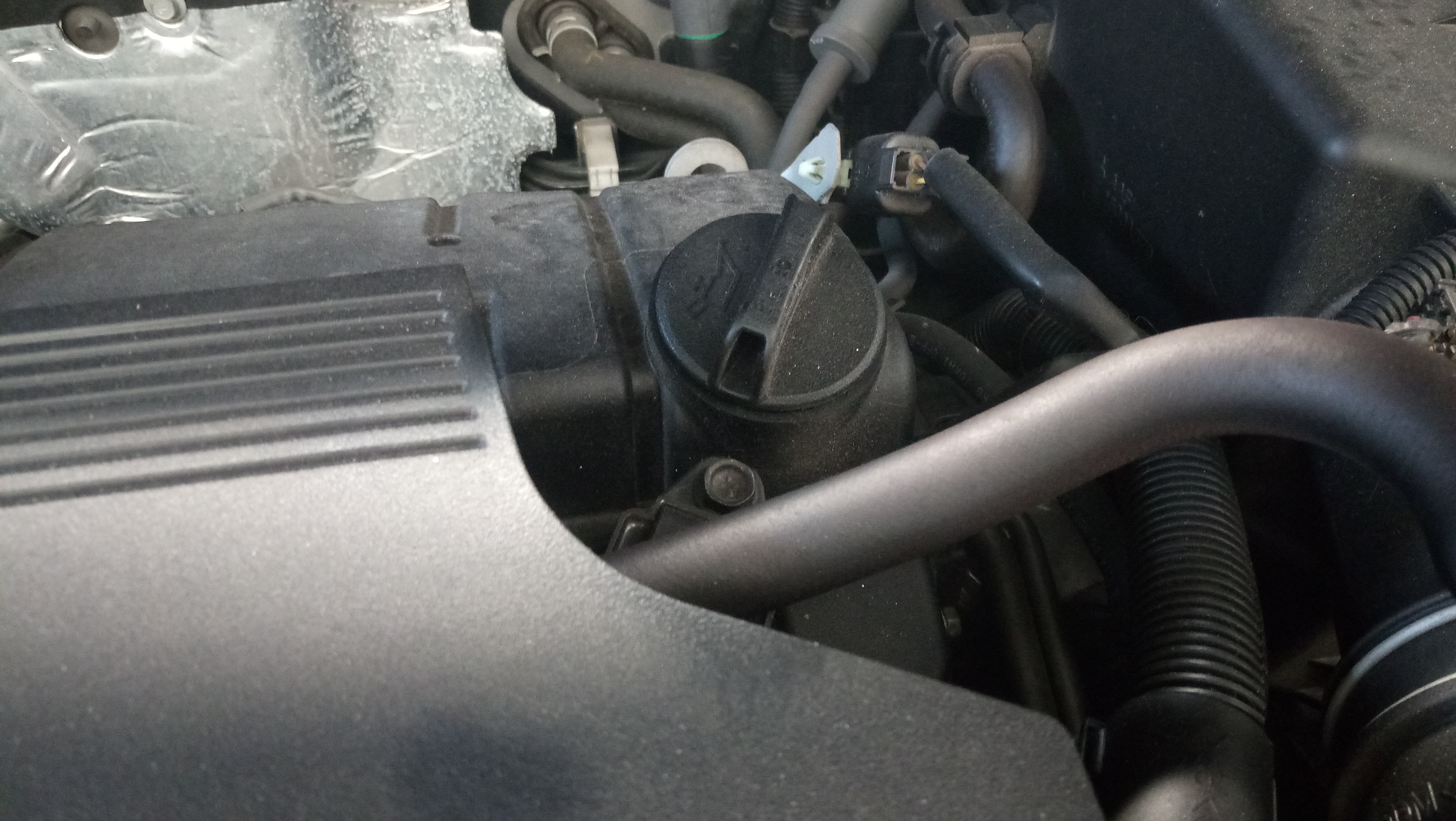 三菱欧蓝德换机油用多少,三菱欧蓝德更换胜牌机油