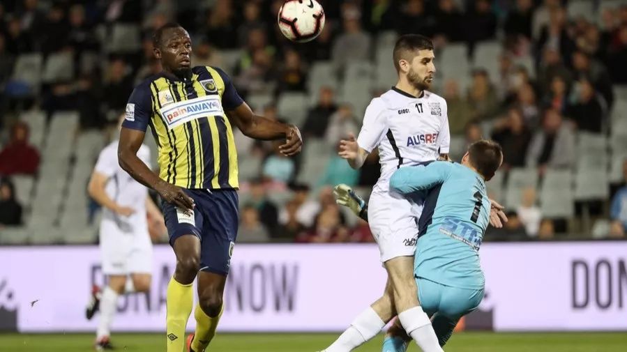 飞人博尔特终结足球梦,田径传奇博尔特