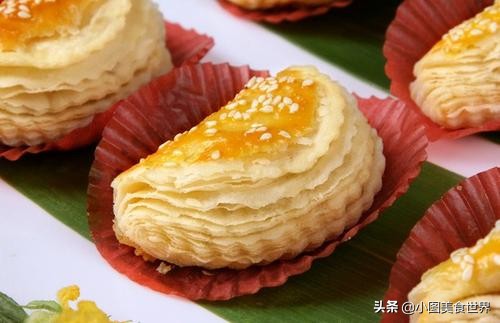 榴莲酥做好后层次分明、异常松化，刚出炉就被家里的小孩分完了