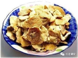 红布包和黄布包,红布包裹紧盛满小米的碗