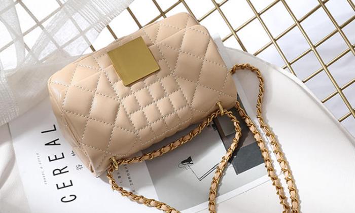 利用挑选的三个原则,学会挑对真皮包包,做个有品味的女生