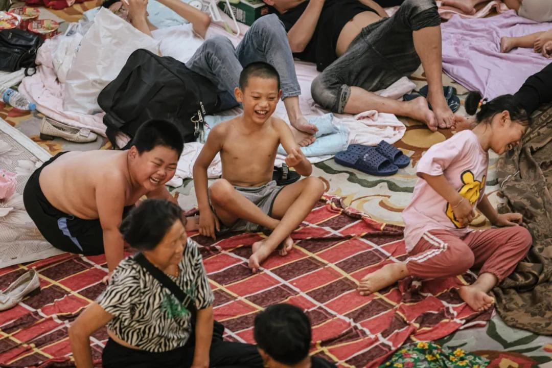 人在新乡，我们的家还在水里