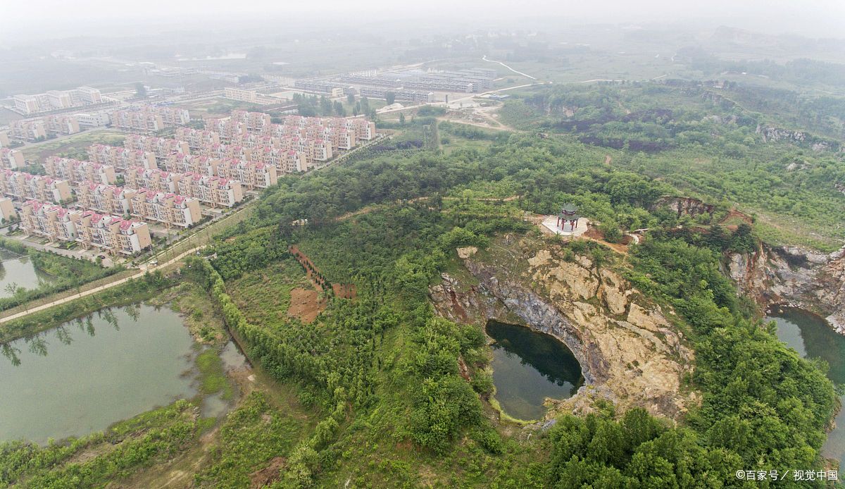 为什么信阳师范学院到处建新校区,信阳师范学院是在郊区吗