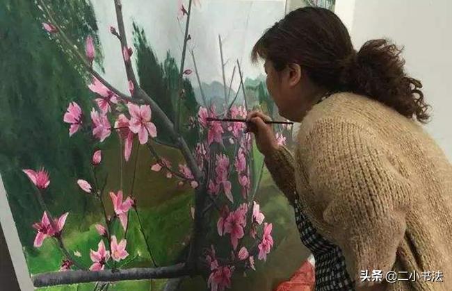 同样是画桃花，农民的卖200元，艺术家的却卖1500万