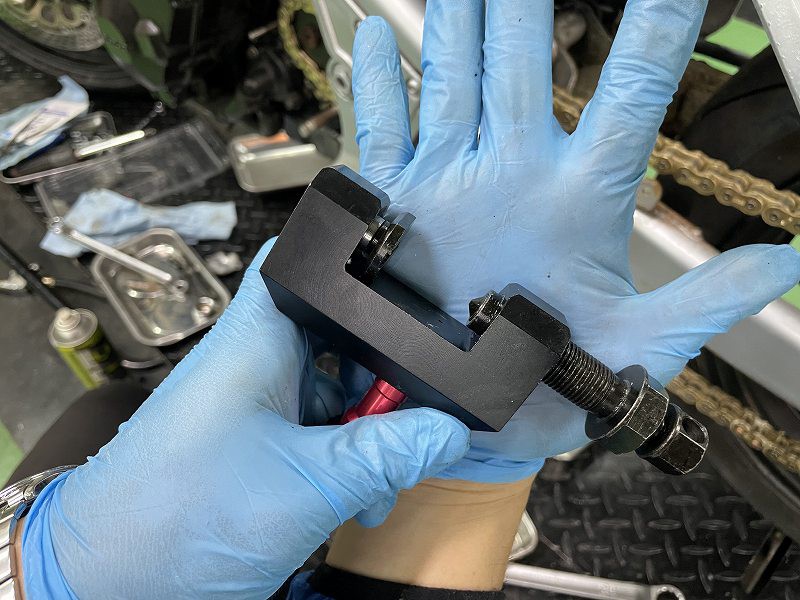 摩托车前链条改16齿,摩托车换牙盘链条教程