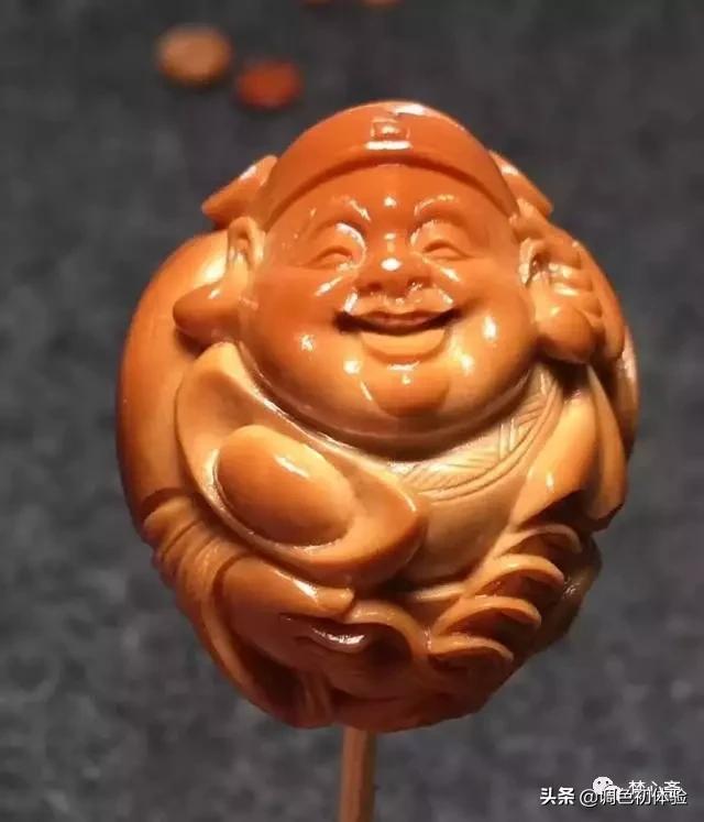 玩橄榄核要有技巧,橄榄核雕什么题材好