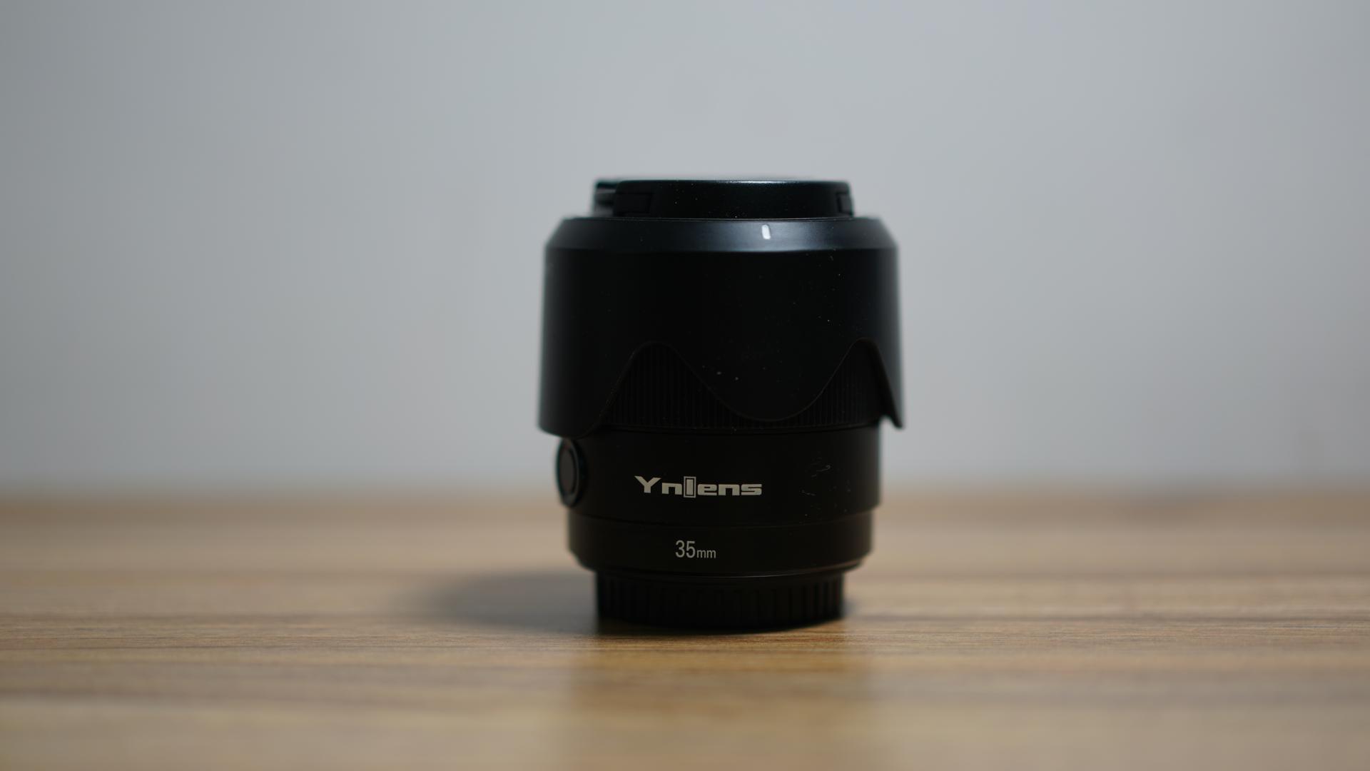 永诺yn35mmf2标准定焦镜头测评,永诺35mmf2和适马35f2对比