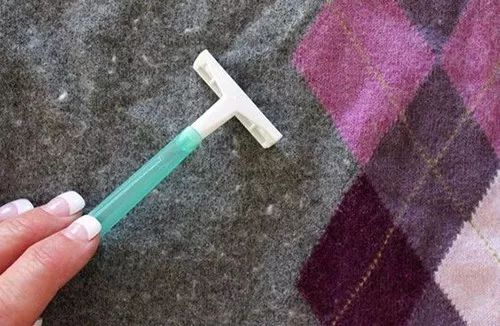 羊毛衣能用含酶洗衣粉吗,羊毛衣可以用洗衣粉吗