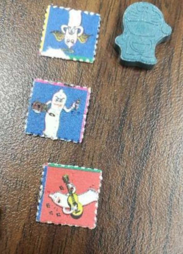 海口海关截获邮票毒品,大连海关查获伪装成糖果的毒品