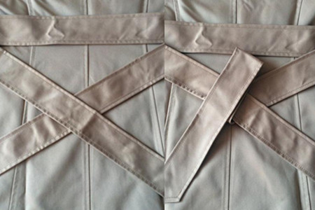 风衣蝴蝶结的系法图解视频教程,风衣袖子上的蝴蝶结系法慢动作