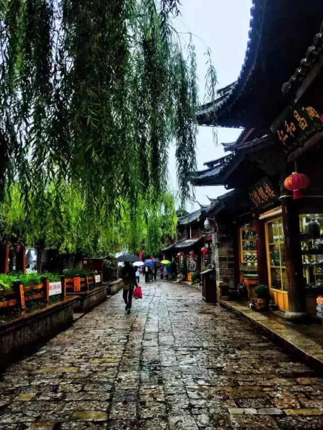 雨天丽江古城旅游攻略,来丽江看雨中的丽江古城