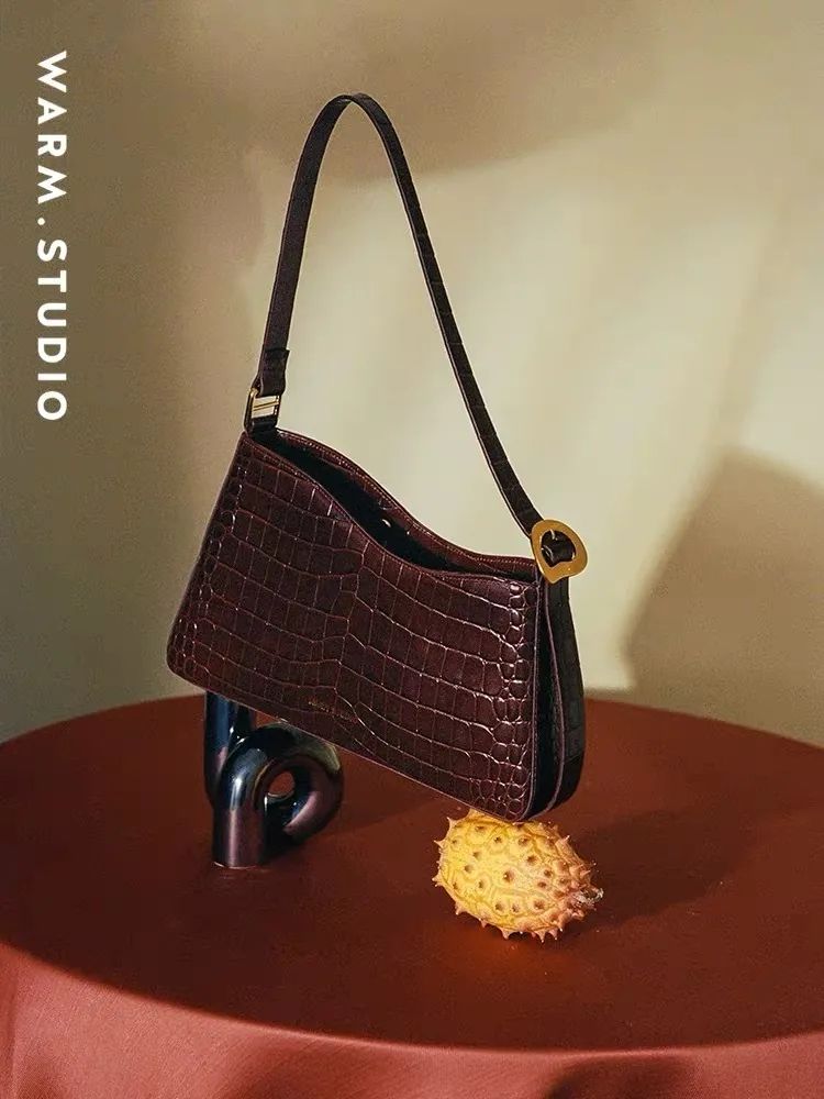 比较实惠的设计师品牌包包,设计师品牌的包包推荐