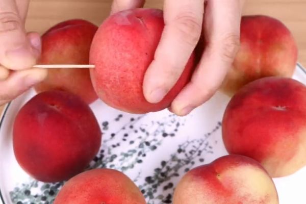 桃子怎样插牙签,桃子上供有啥寓意