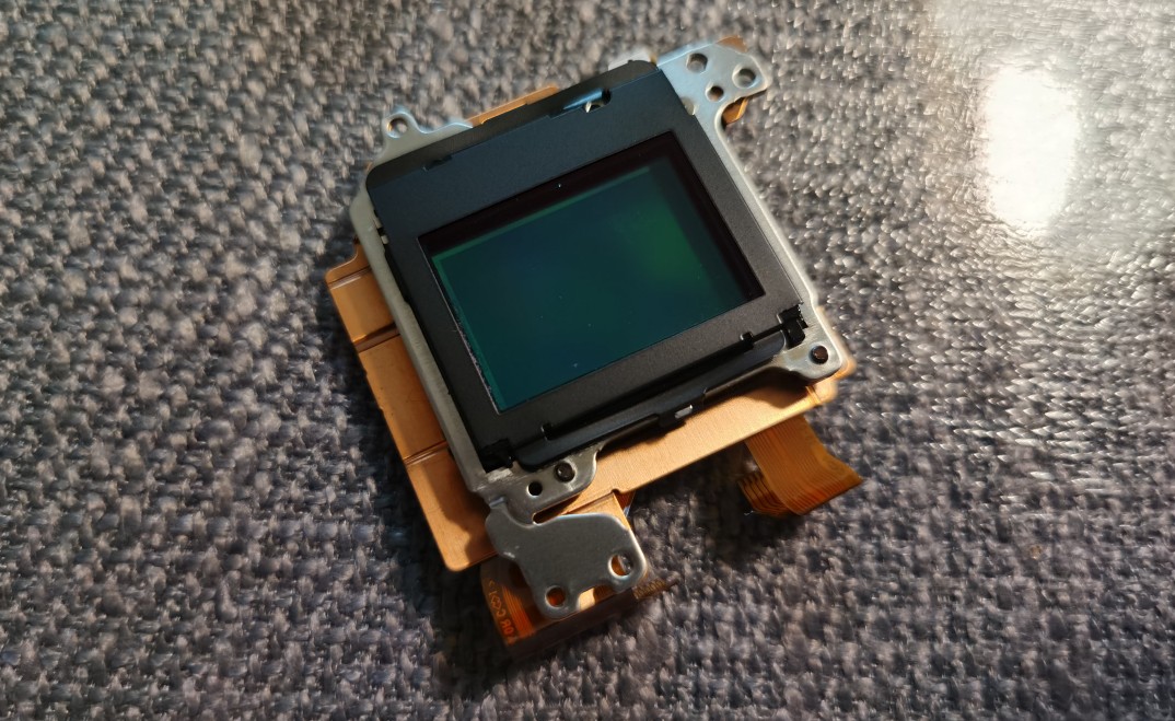 索尼相机更换快门组件,索尼微单相机电池盖拆卸教程