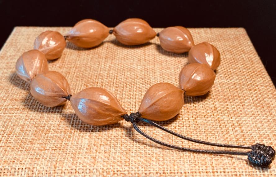 文玩橄榄核是什么品种的,什么样的橄榄核手串最好