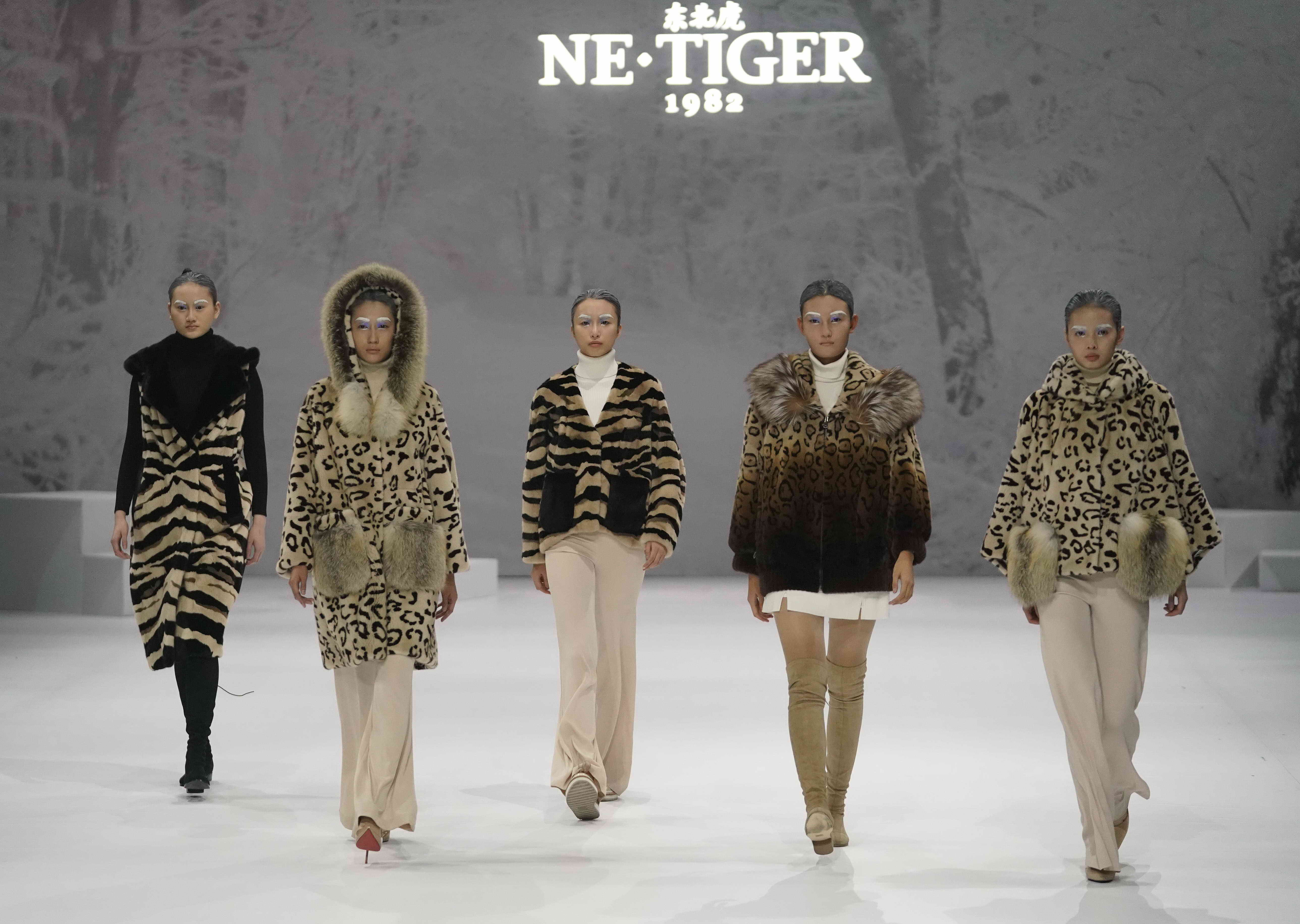 netiger高定晚礼服,netiger东北虎品牌logo