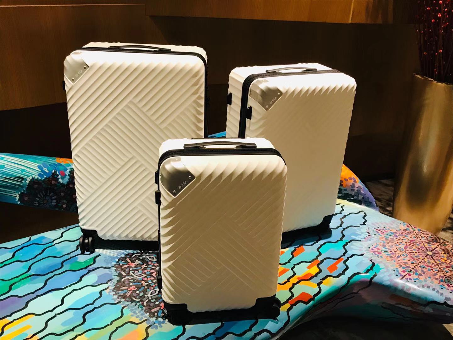 旅行箱轮子上有型号吗,旅行箱的轮子怎么弄