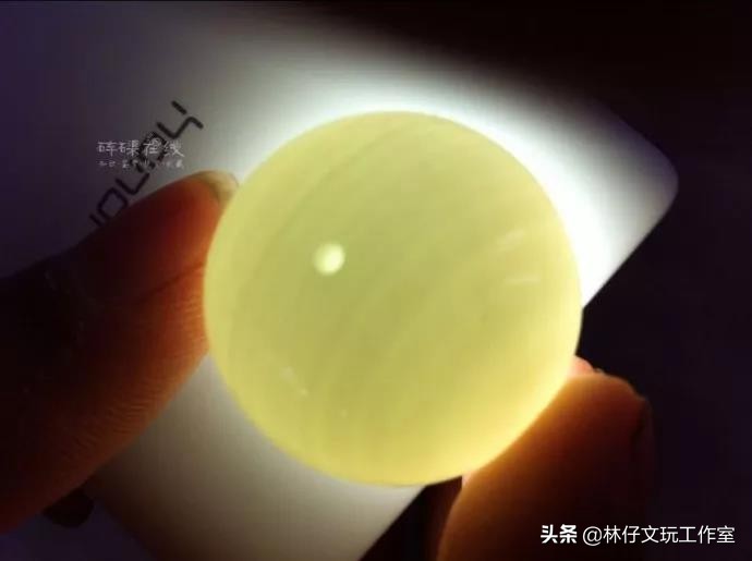 真假金丝砗磲对比照片,紫光灯照白砗磲的真假鉴别