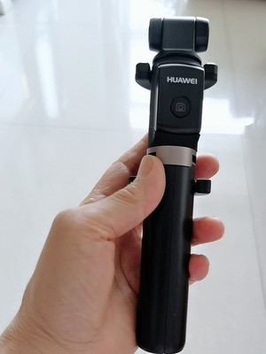 华为三脚架自拍杆af15怎么用,华为有线自拍杆的使用方法及操作