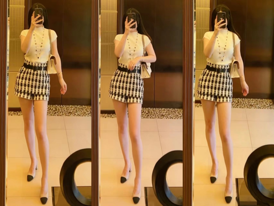 千鸟格半身裙秋冬款a字版30岁,黑白千鸟格半身裙配原绒色毛衫