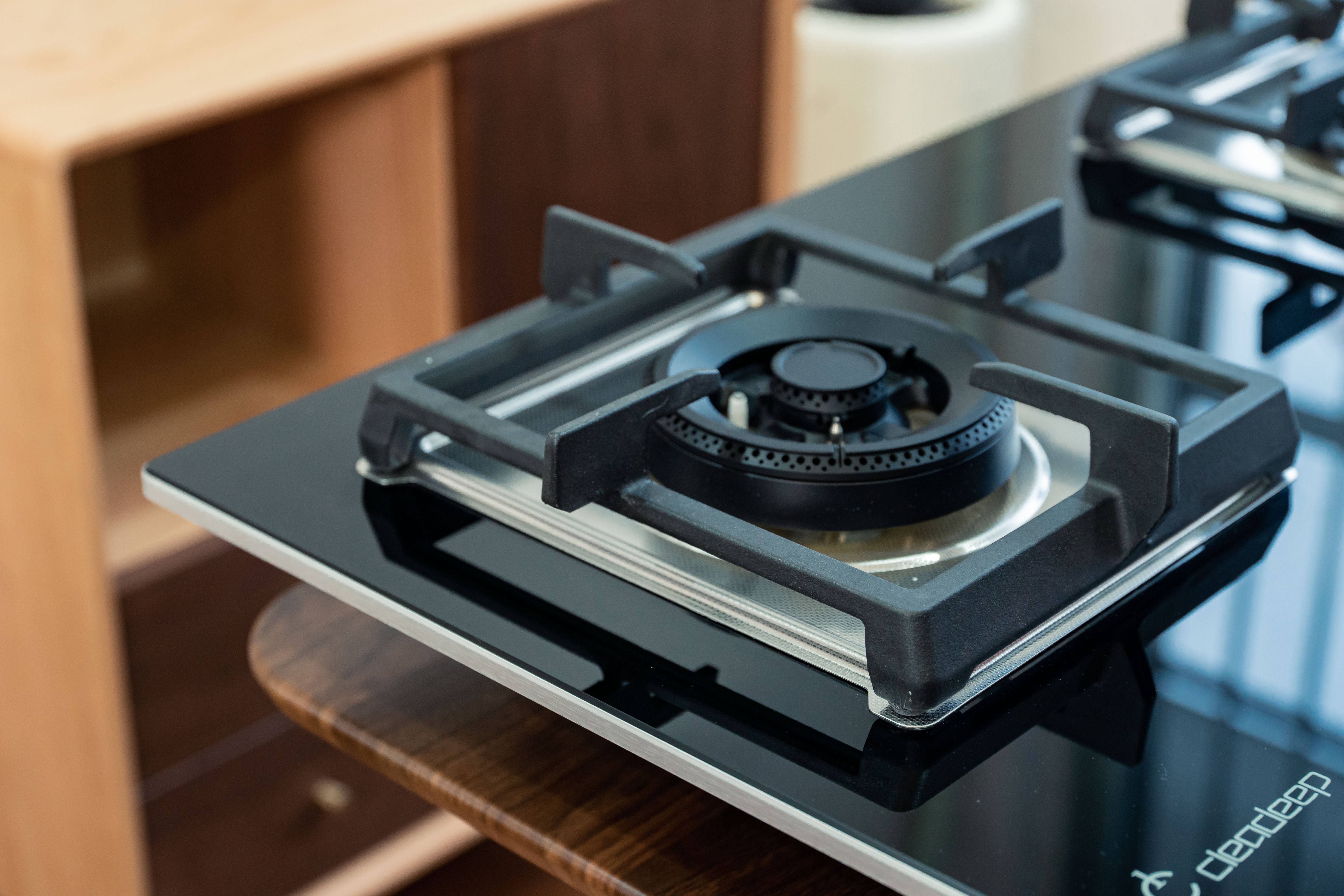 燃气灶打不着火该怎么清理,燃气灶点不燃是修还是换