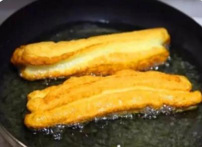 油条怎么做才能蓬松酥脆凉了不硬,家里油条怎样做才能蓬松酥脆