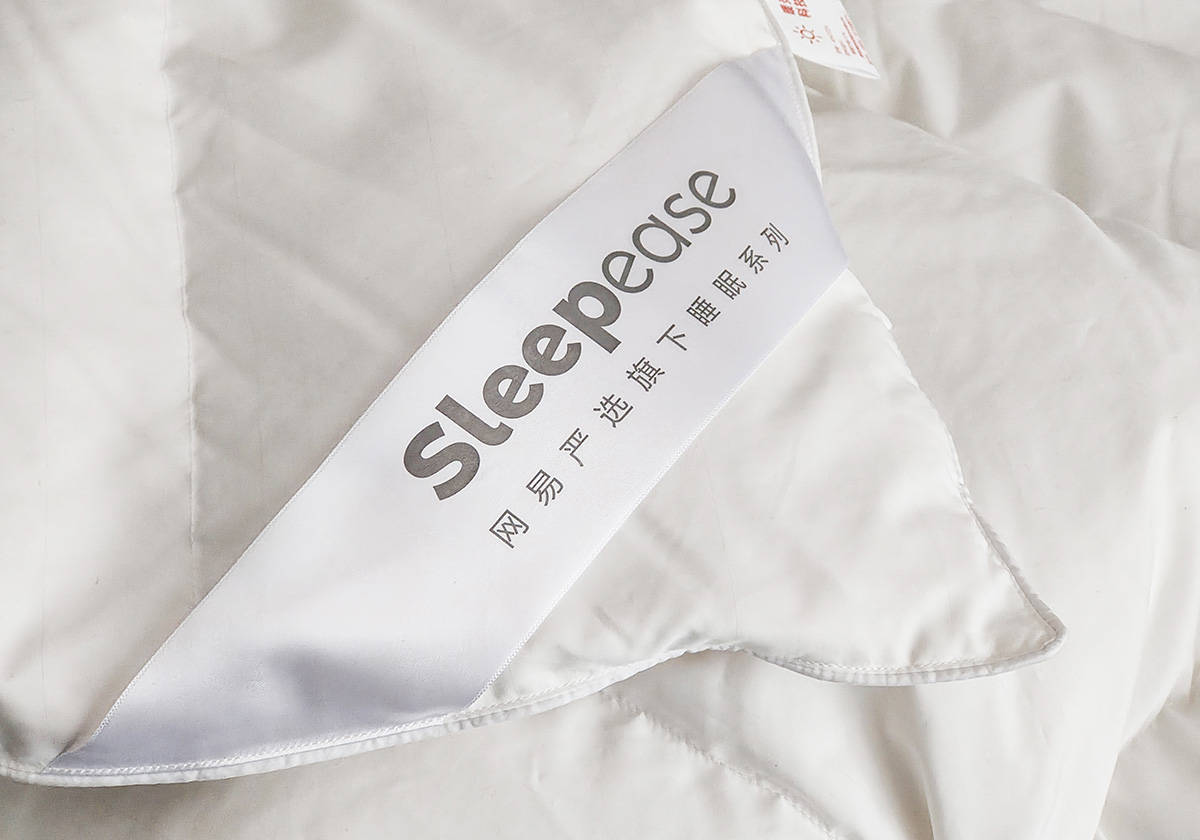 冬天盖鹅绒被暖和吗,夏天睡鹅绒被的体验