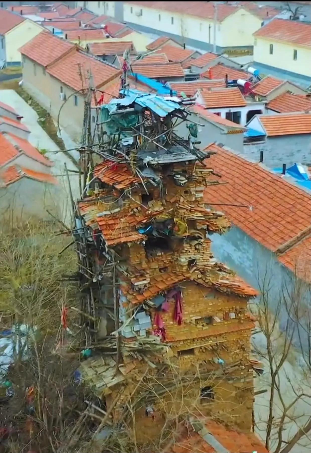 智障大爷建造七层土楼,智障老农为弟弟盖七层婚房