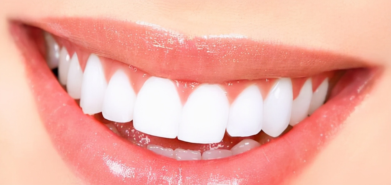 天生牙齿黄能洗白吗,牙齿天生黄是什么原因引起的