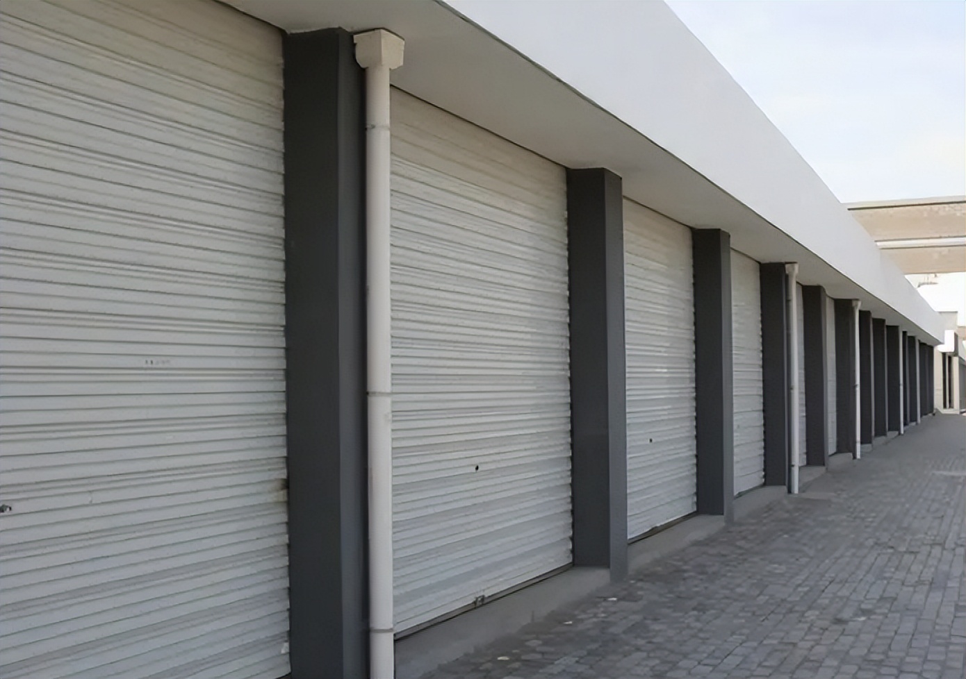 手拉卷帘门故障及维修方法,地库快速卷帘门故障及维修方法