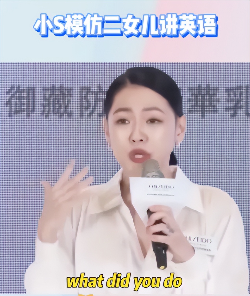 小s拿着勺子穿红衣广告照,小s二女儿新广告