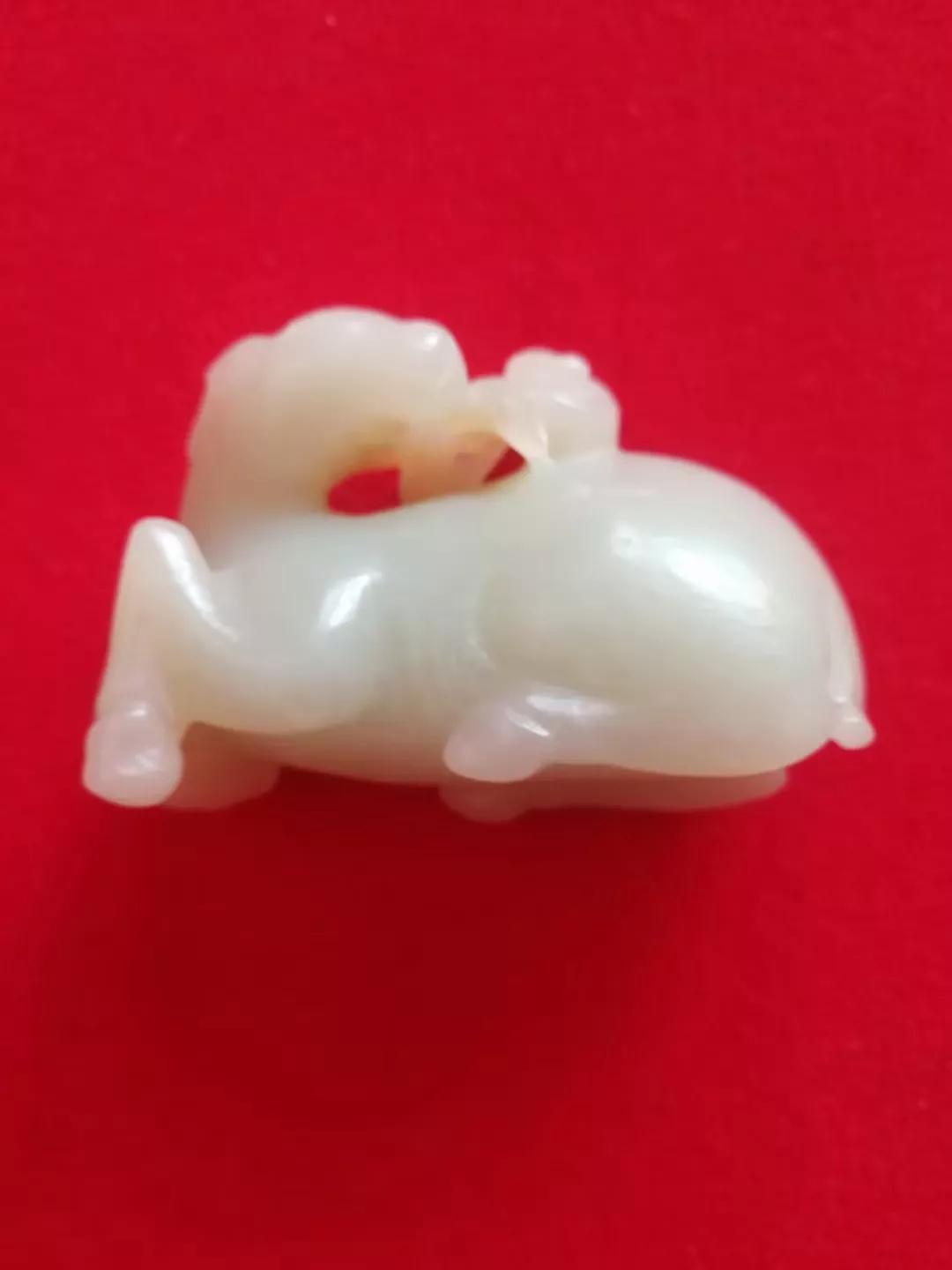 100斤的和田玉雕值多少钱,国宝和田玉雕