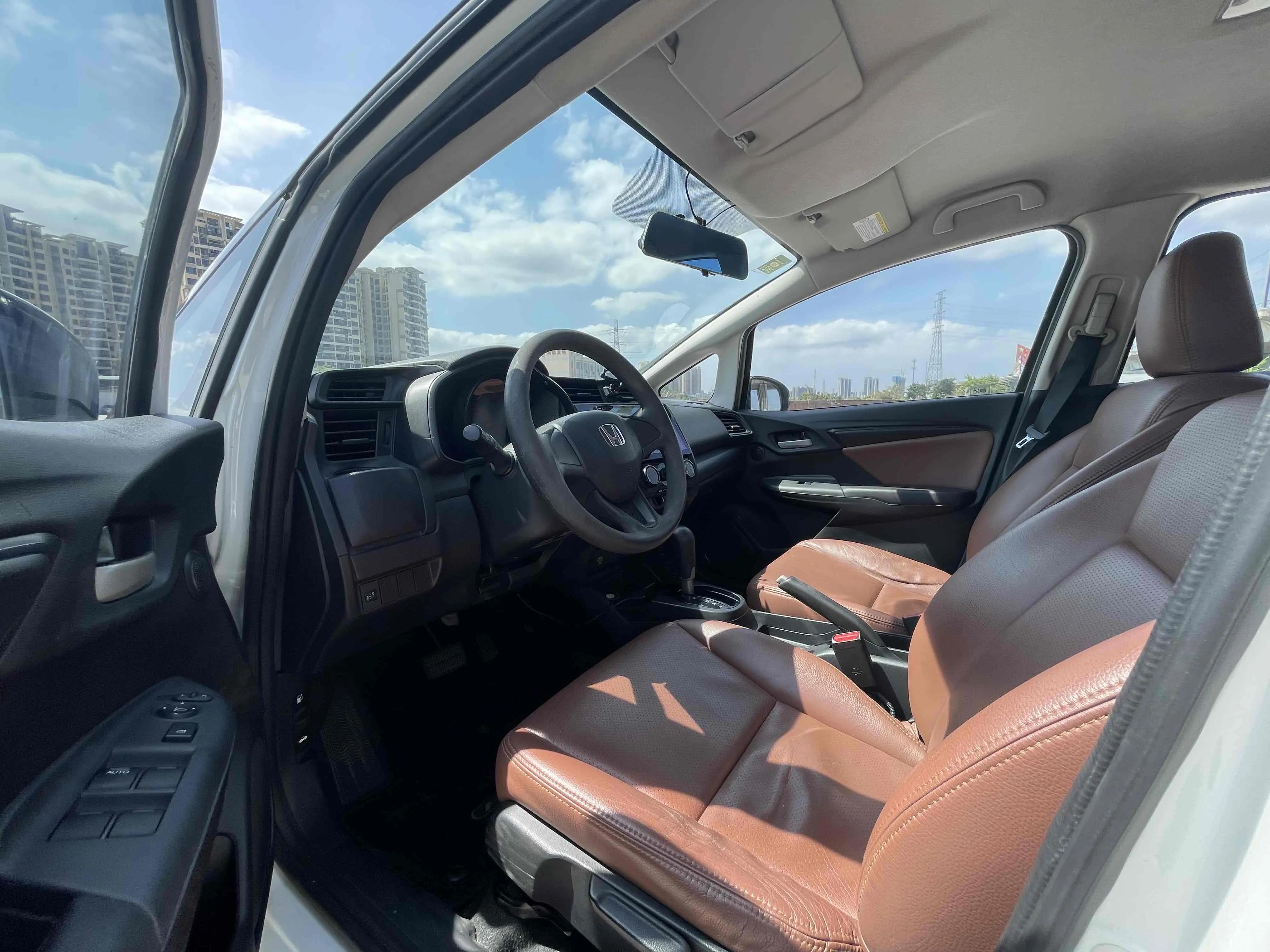 飞度2014款1.5cvtexli领先版价格,本田飞度09款1.3l图片