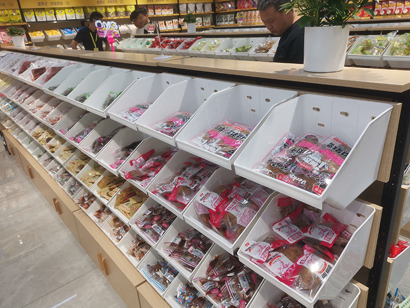 童零纪潮趣零食店亳州,童零纪零食店模仿的哪个品牌