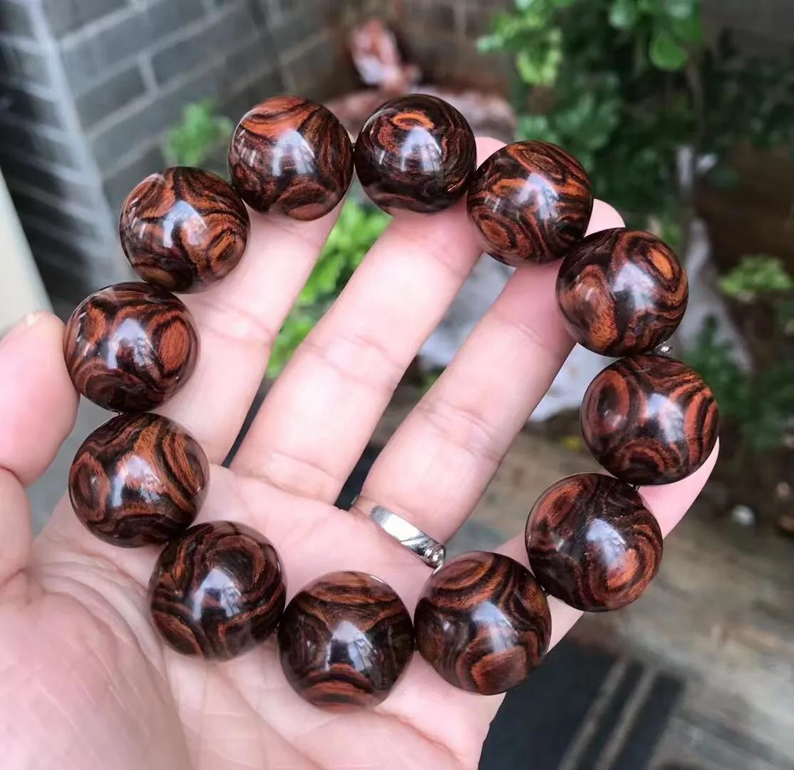 海南黄花梨紫油梨怎么鉴别真伪,海南黄花梨紫油梨怎么鉴别