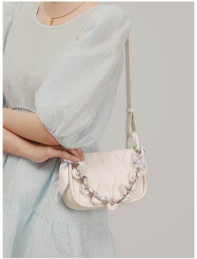 40到50岁女人适合背什么包包,40岁女性背什么牌子的包包